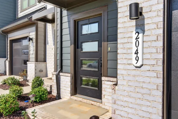 a view of a door of the house front of house