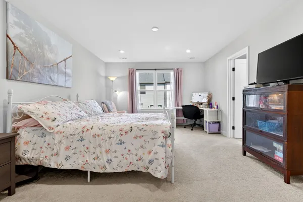 a room with furniture and a window