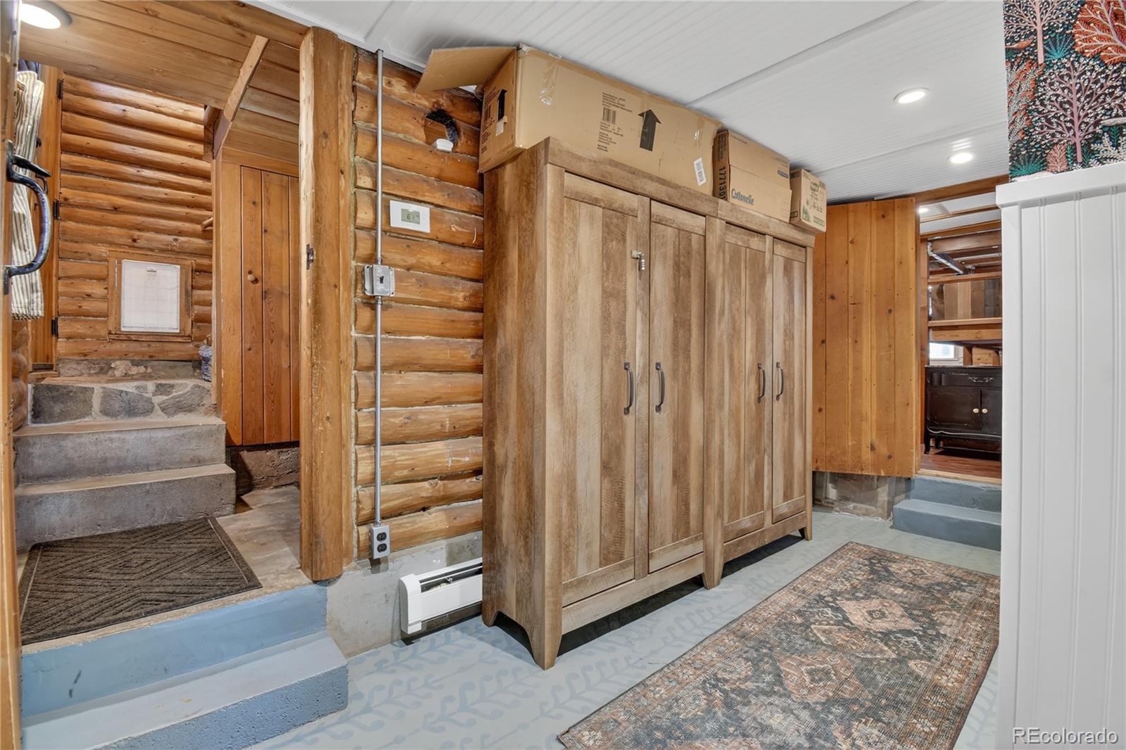 23301 Shoshone Road Indian Hills, CO 80454 - Photo 15 of 32 a view of a entryway door of the house