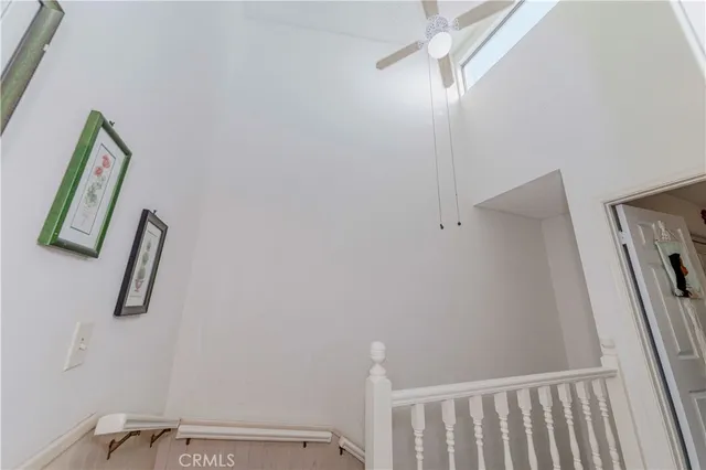 a view of a hallway with staircase