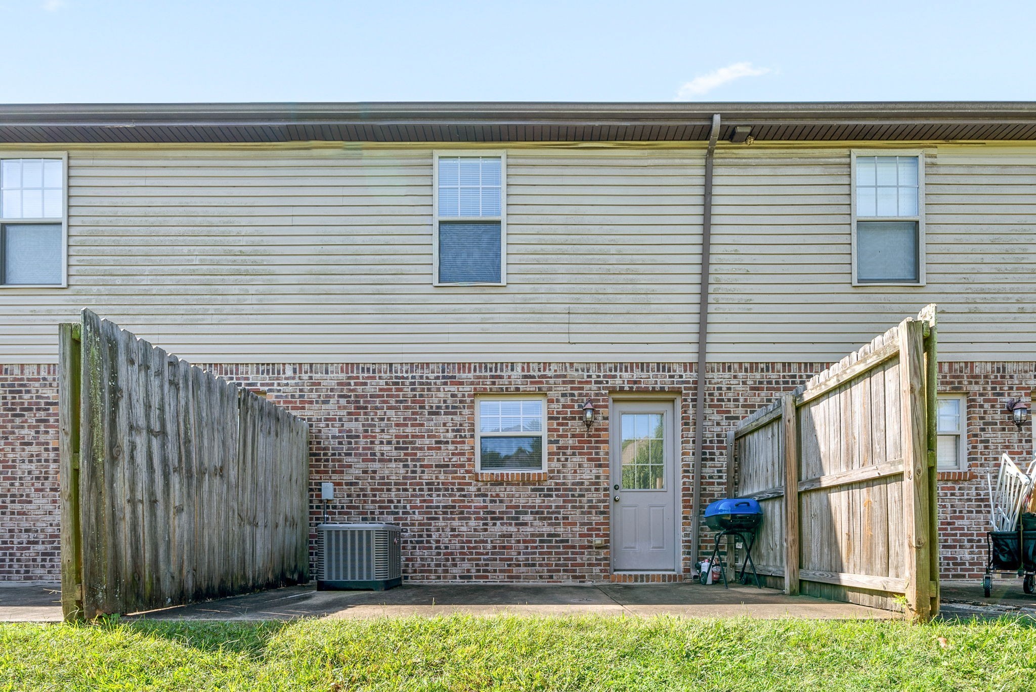 1769 Spring Water Drive, Unit C Clarksville, TN 37040 - Photo 25 of 25 a view of a house with a yard and wooden floor