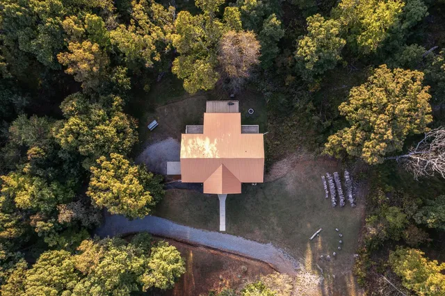 a view of a livingroom with furniture and a flat screen tv