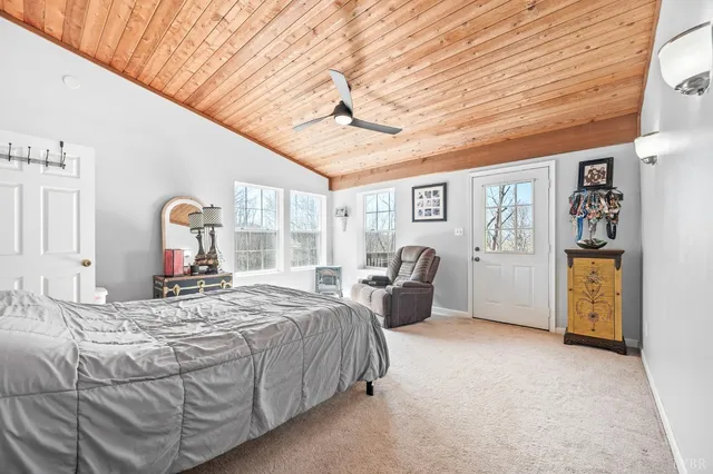 a bedroom with a bed and a walk in closet