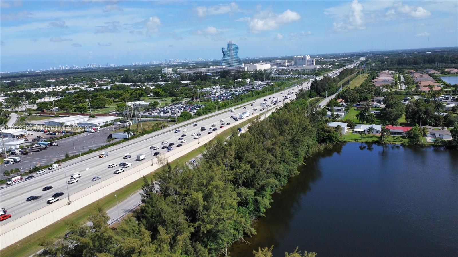 5221 Orange Drive Davie, FL 33314 - Photo 19 of 19 a city view with a city skyline in the background