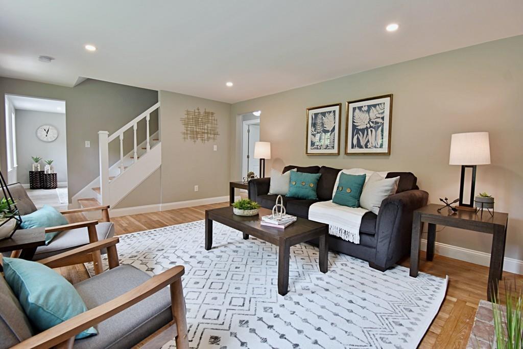 65 Spaulding Road Chelmsford, MA 01824 - Photo 15 of 42 a living room with furniture and a table