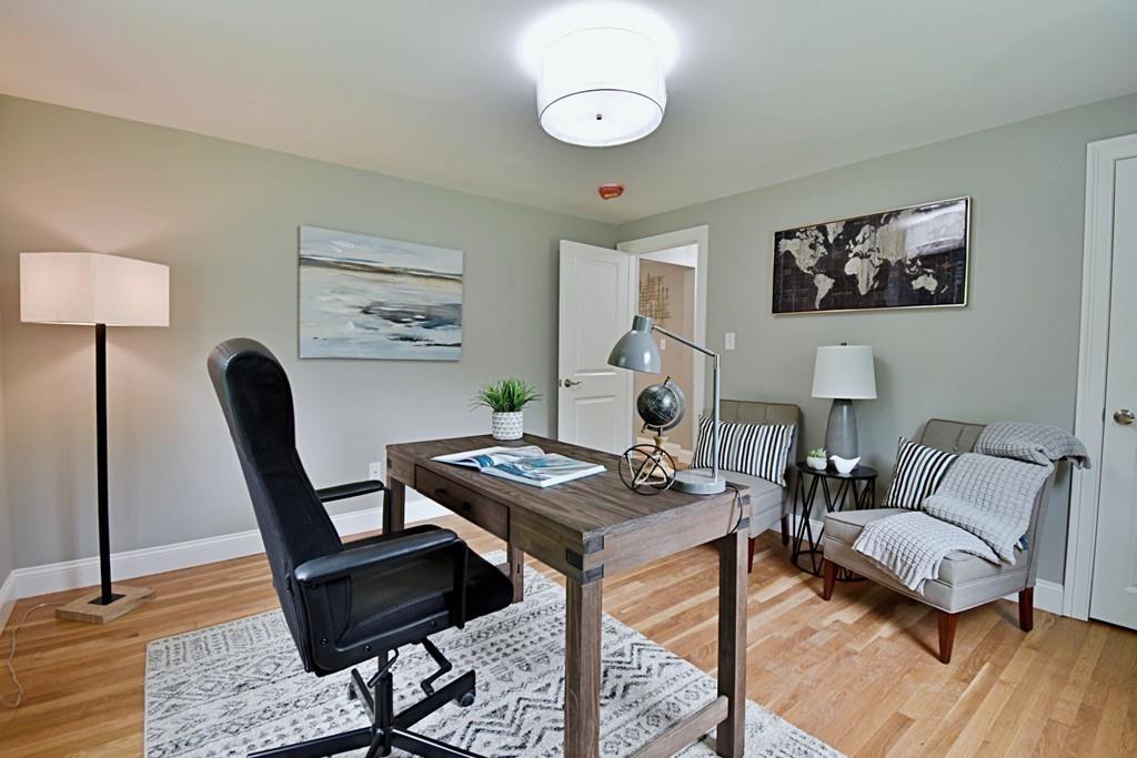 65 Spaulding Road Chelmsford, MA 01824 - Photo 20 of 42 a living room with furniture and wooden floor