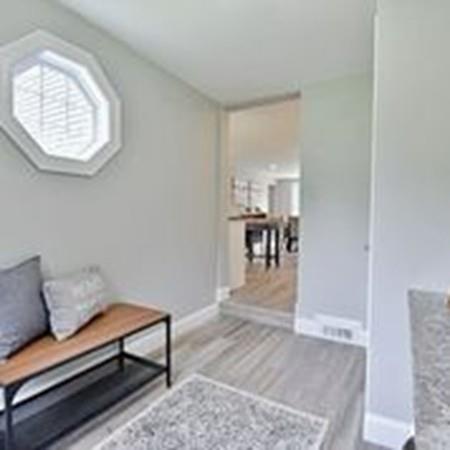 65 Spaulding Road Chelmsford, MA 01824 - Photo 22 of 42 a living room with furniture and a table