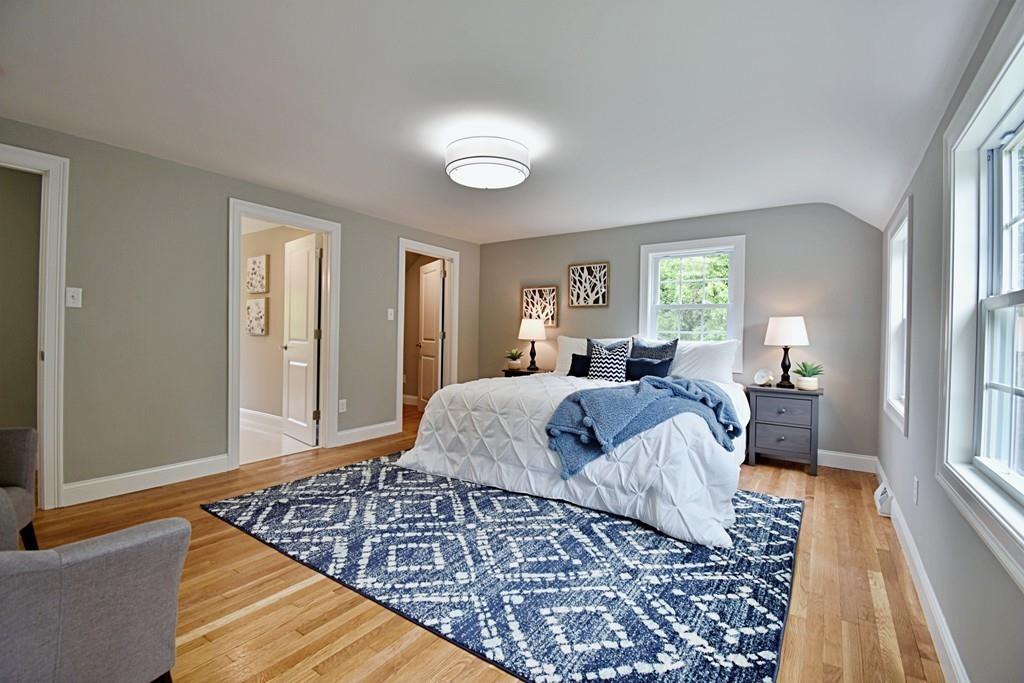 65 Spaulding Road Chelmsford, MA 01824 - Photo 25 of 42 a bedroom with a large bed and a window