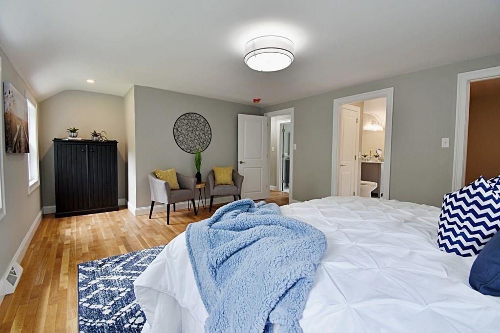 65 Spaulding Road Chelmsford, MA 01824 - Photo 26 of 42 a bedroom with a bed and a table