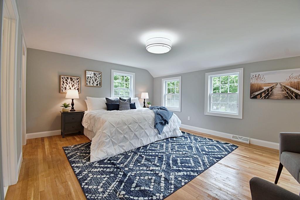 65 Spaulding Road Chelmsford, MA 01824 - Photo 27 of 42 a bedroom with wooden floor and a window