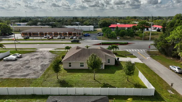 an aerial view of a bathroom with swimming pool