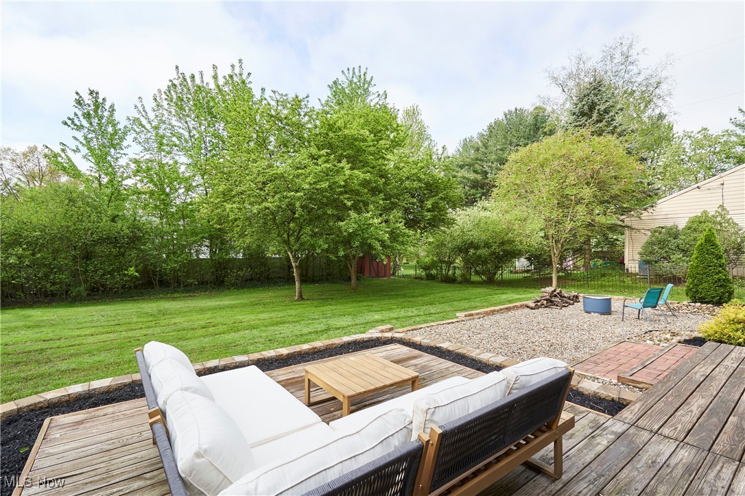 2530 Holgate Road Akron, OH 44313 - Photo 4 of 31 Wooden terrace with outdoor lounge area and a yard