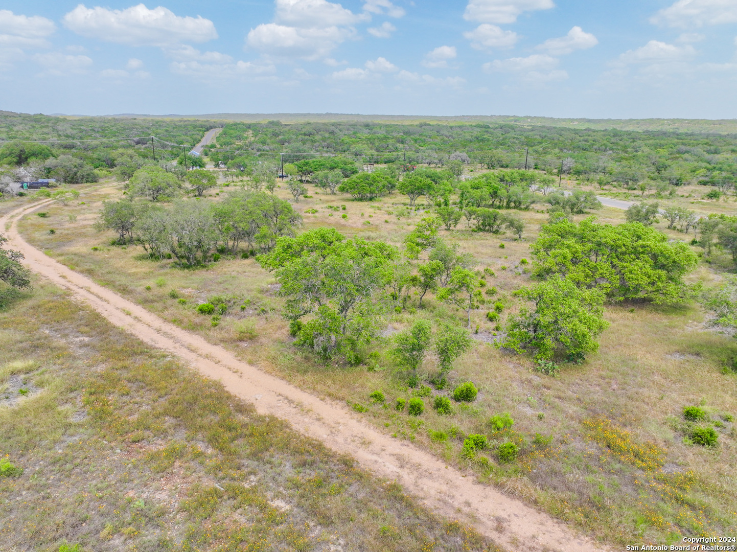 264 Grand Ranch Hondo, TX 78861 - Photo 14 of 16 a view of a yard with an outdoor space