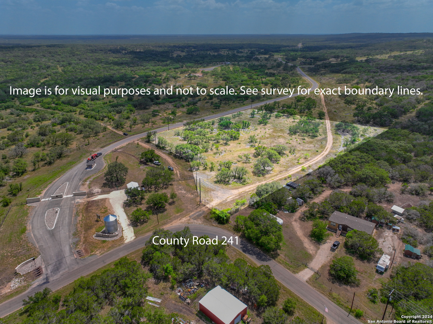 264 Grand Ranch Hondo, TX 78861 - Photo 2 of 16 an aerial view of residential houses with outdoor space