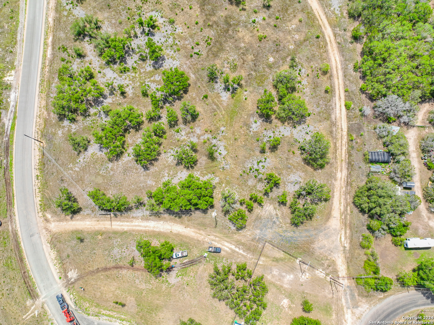 264 Grand Ranch Hondo, TX 78861 - Photo 8 of 16 a view of a lot of plants and flowers in front of main door