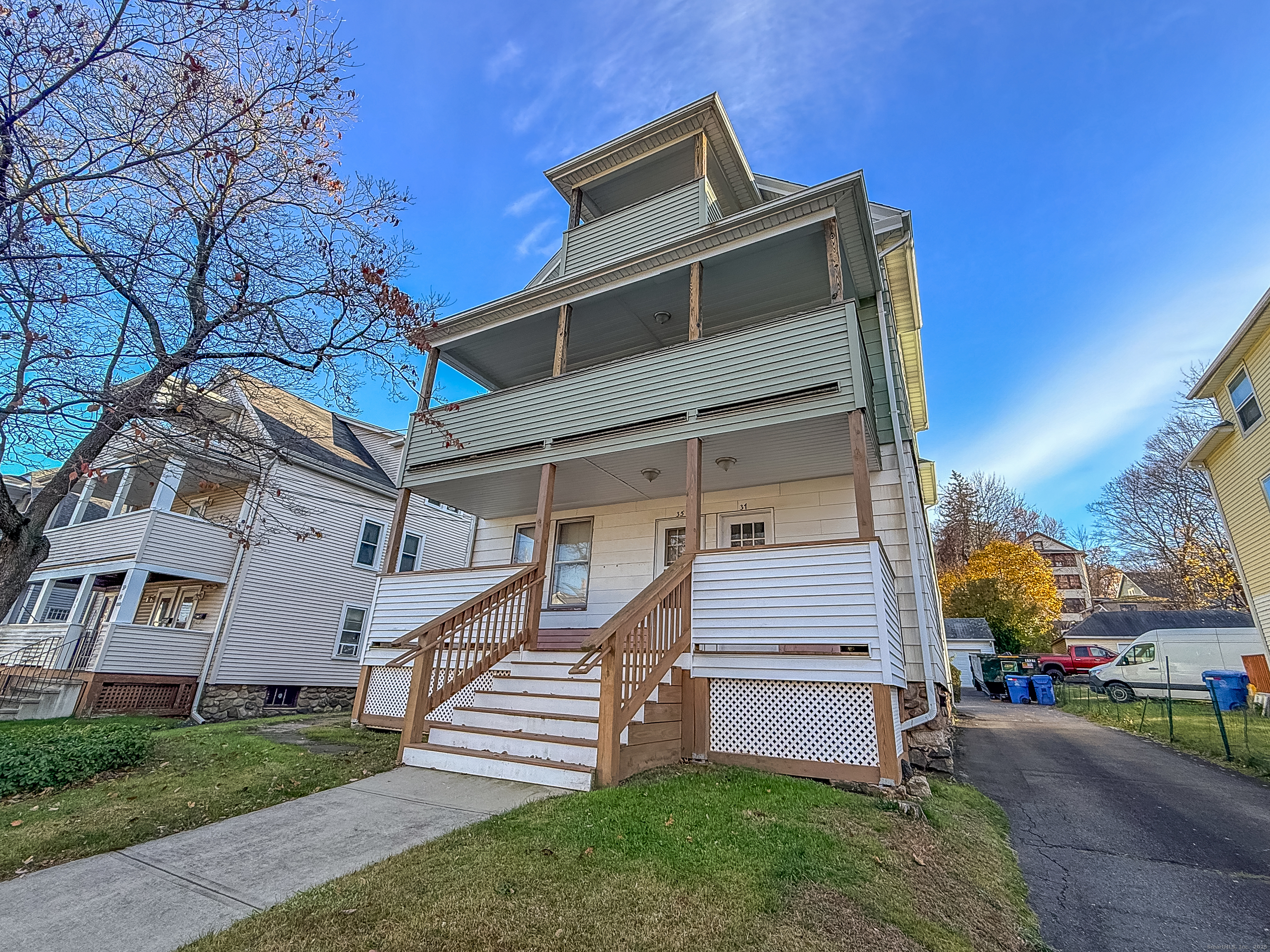 front view of a house with a yard
