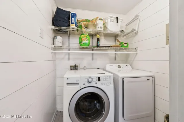 a utility room with dryer and washer