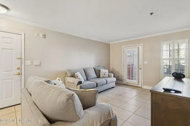 a living room with furniture and a window
