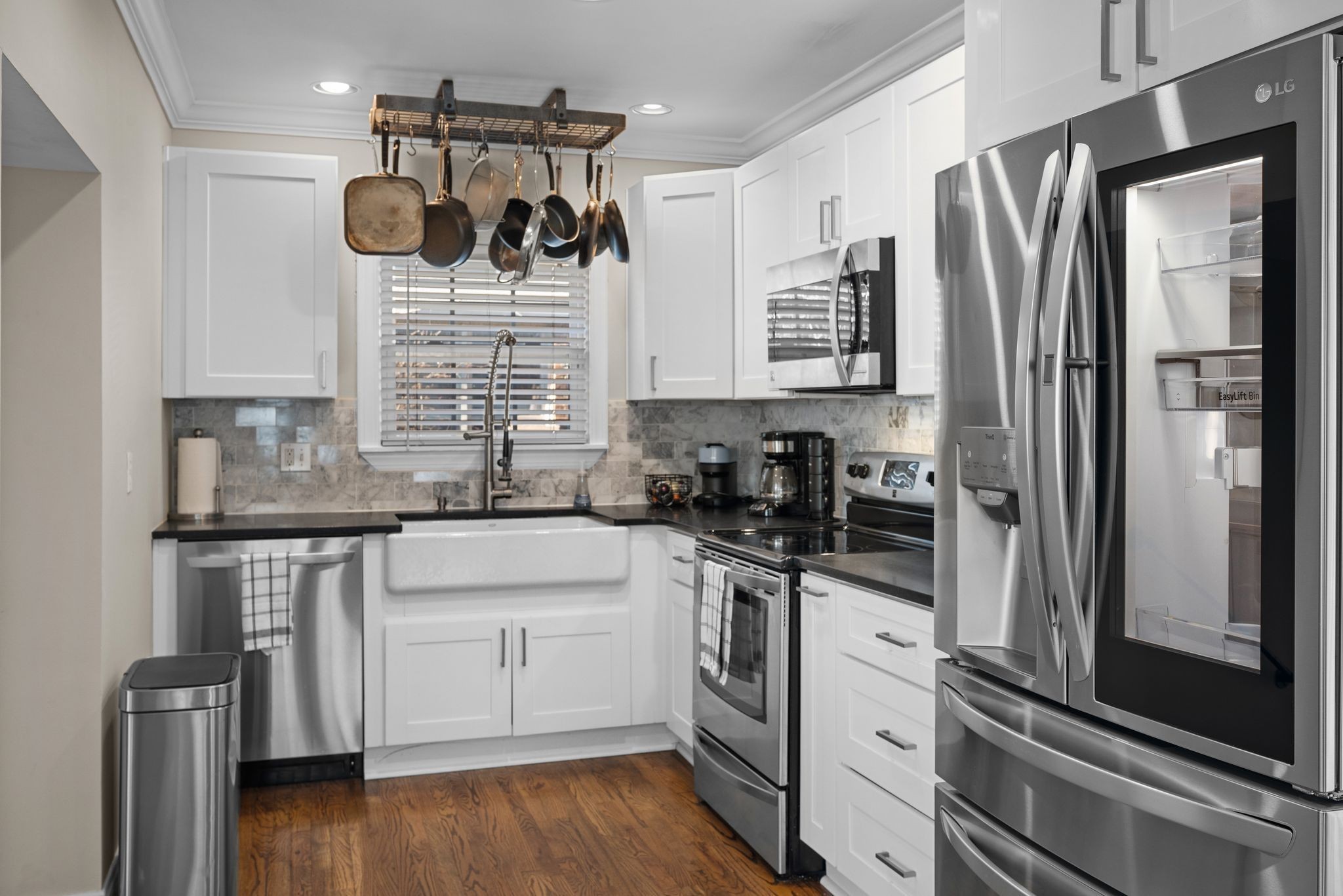 816 Inverness Avenue Nashville, TN 37204 - Photo 12 of 39 a kitchen with a refrigerator and a sink