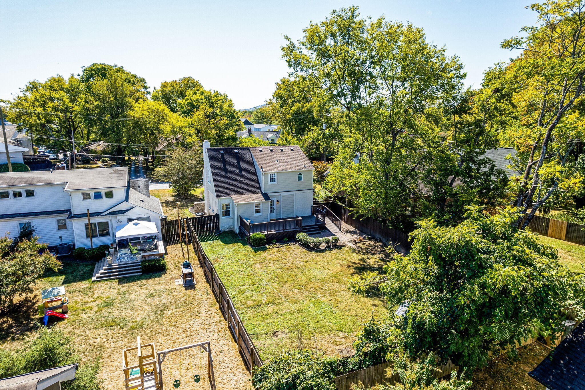 816 Inverness Avenue Nashville, TN 37204 - Photo 32 of 39 an aerial view of a house with swimming pool and large trees