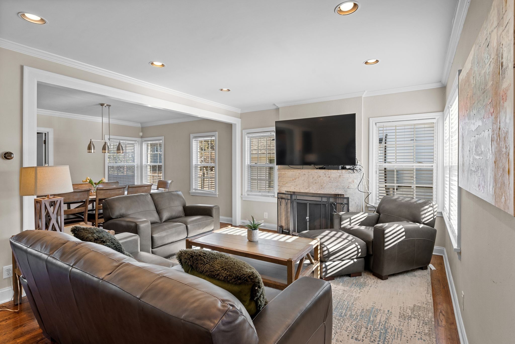 816 Inverness Avenue Nashville, TN 37204 - Photo 5 of 39 a living room with furniture a fireplace and a flat screen tv