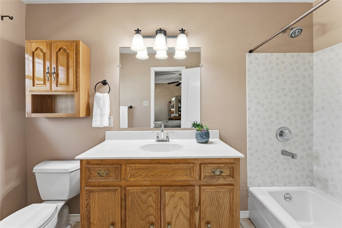 306 Starview Drive Georgetown, TX 78628 - Photo 17 of 26 Bedroom #2 ensuite bathroom with shower / bathtub combination and vanity