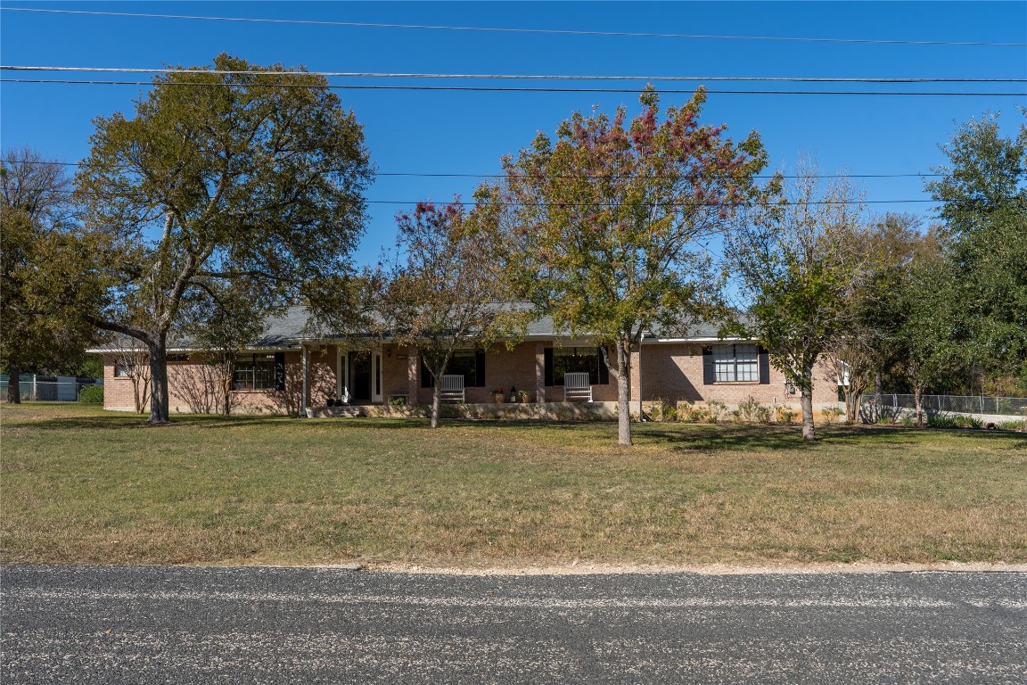 306 Starview Drive Georgetown, TX 78628 - Photo 2 of 26 Ranch-style house featuring a porch and brick siding