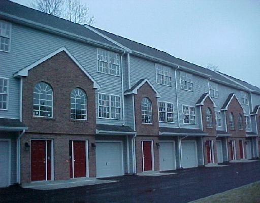 3100 Madison Avenue, Unit 5 Bridgeport, CT 06606 - Photo 1 of 1 a front view of residential houses