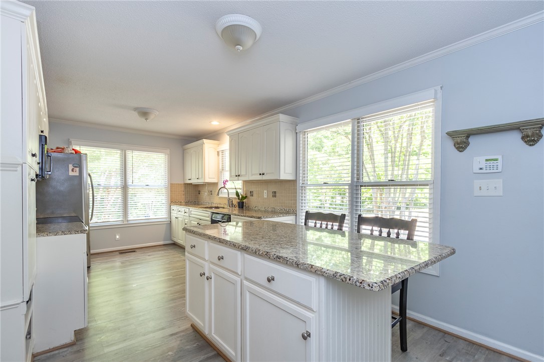 151 Hannah Circle Anderson, SC 29621 - Photo 12 of 46 This bright kitchen features ample counter space and storage, perfect for culinary endeavors.
