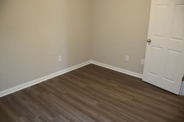 a view of a bathroom from a hallway