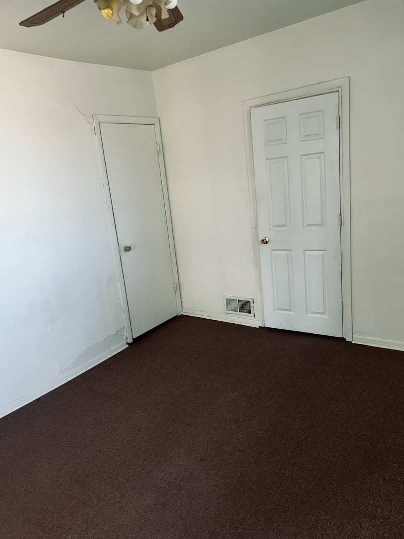 608 West Madison Street Ottawa, IL 61350 - Photo 15 of 23 an empty room with a door