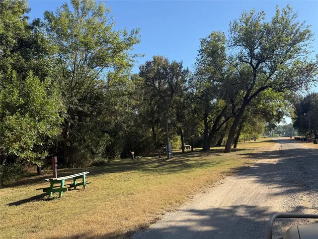 a view of pool table and chairs