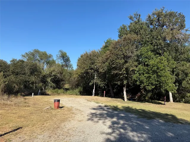 a view of swimming pool with a yard