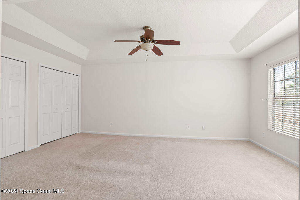4595 Radiant Way, Unit 104 Melbourne, FL 32901 - Photo 15 of 26 Primary_Bedroom-1