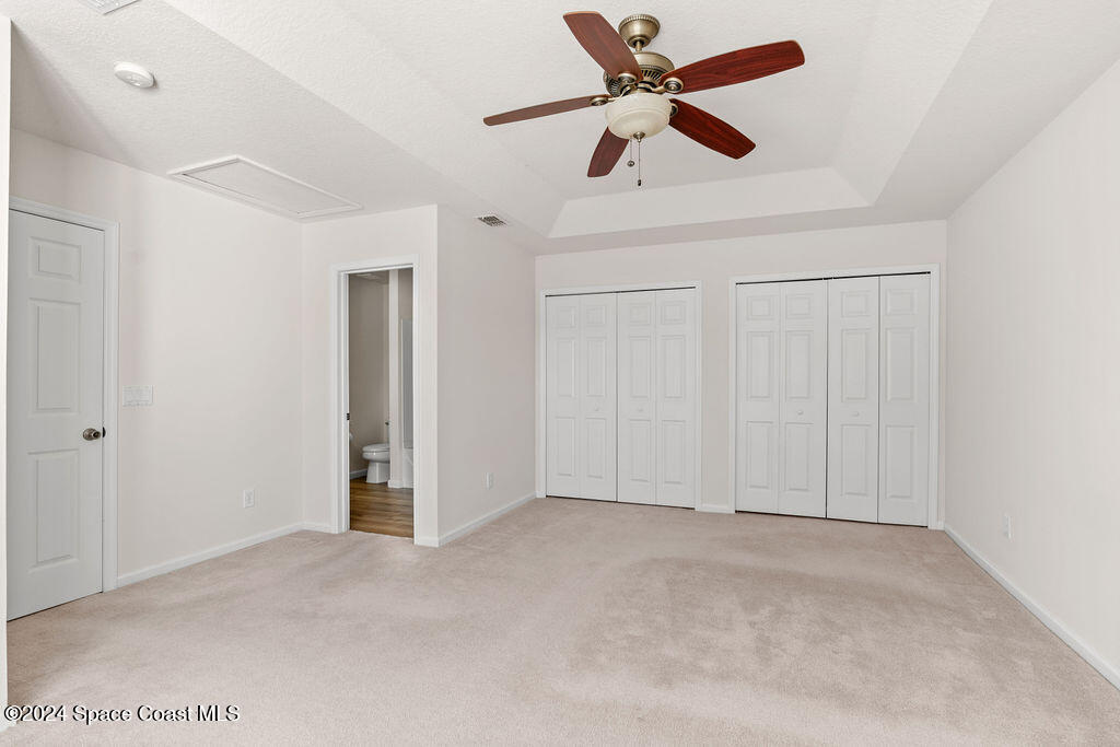 4595 Radiant Way, Unit 104 Melbourne, FL 32901 - Photo 16 of 26 Primary_Bedroom-2