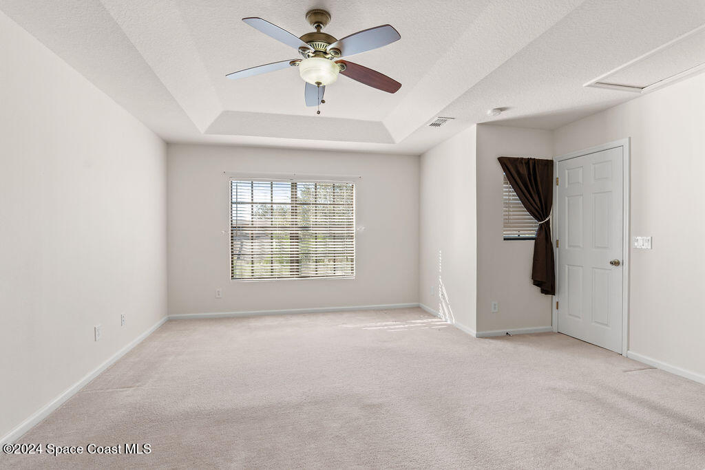 4595 Radiant Way, Unit 104 Melbourne, FL 32901 - Photo 17 of 26 Primary_Bedroom-3