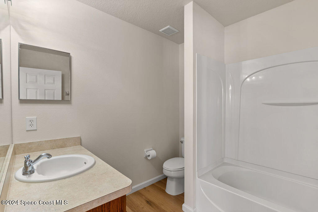 4595 Radiant Way, Unit 104 Melbourne, FL 32901 - Photo 18 of 26 Primary_Bedroom-4