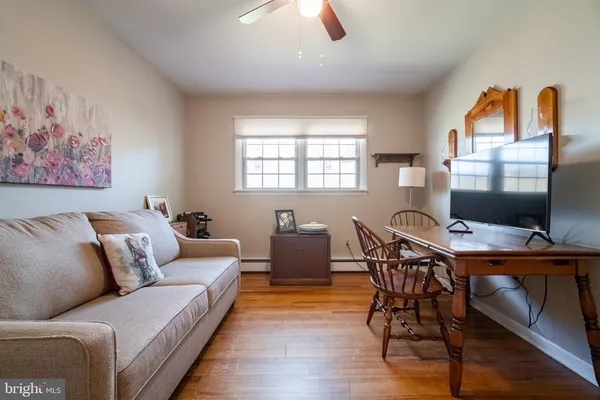 a living room with furniture and window