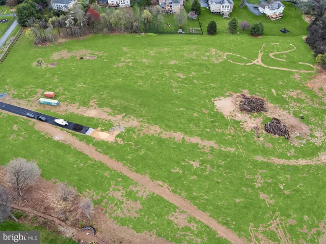 a view of a golf course with a lake