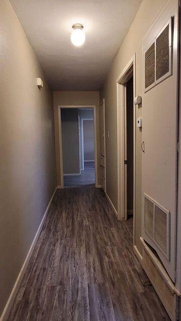 4429 31st Street Lubbock, TX 79410 - Photo 7 of 12 a view of a room with wooden floor and window