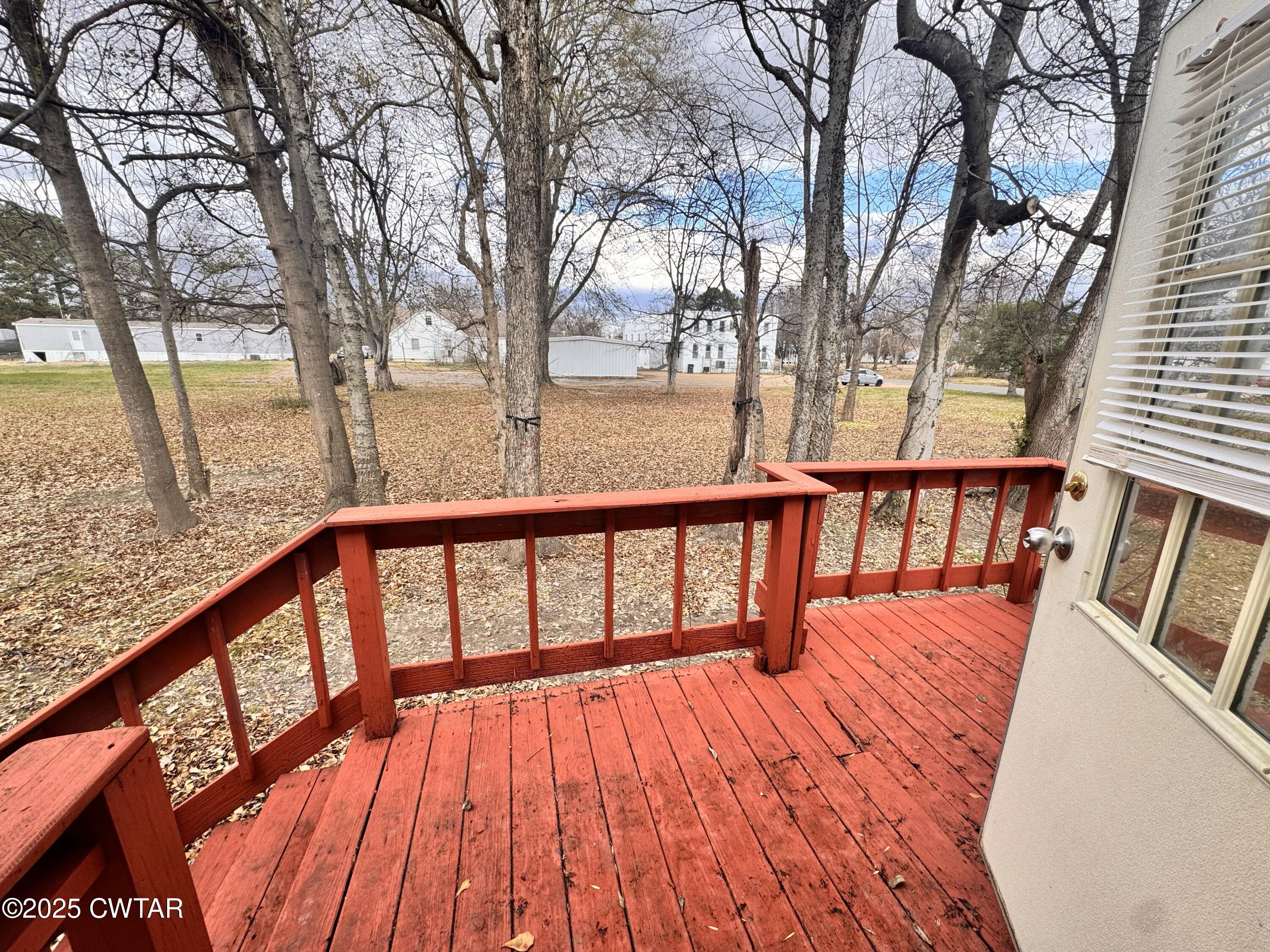 3416 West Troy Street Rives, TN 38253 - Photo 15 of 21 a view of balcony with wooden floor and fence