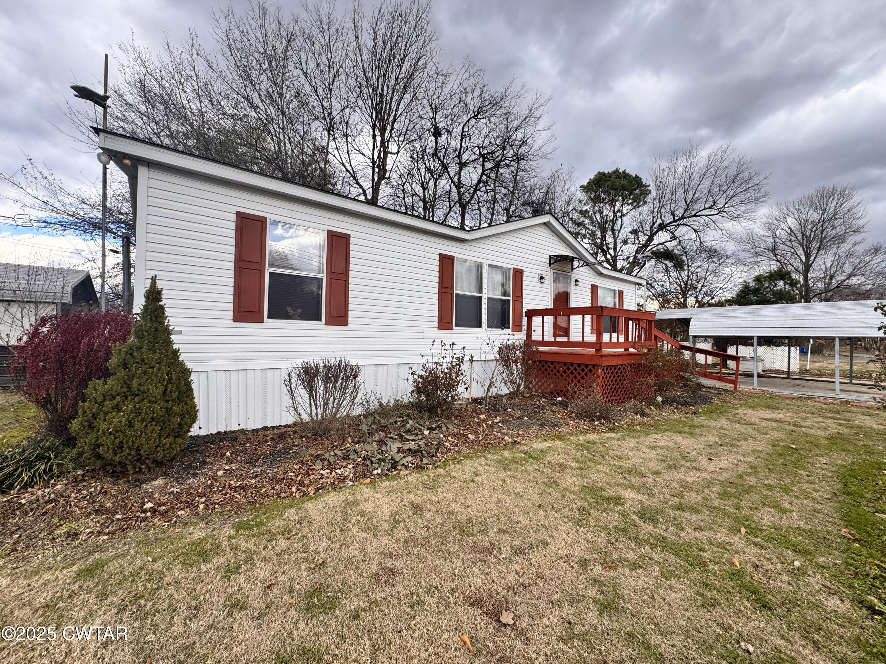 3416 West Troy Street Rives, TN 38253 - Photo 2 of 21 a front view of a house with a yard