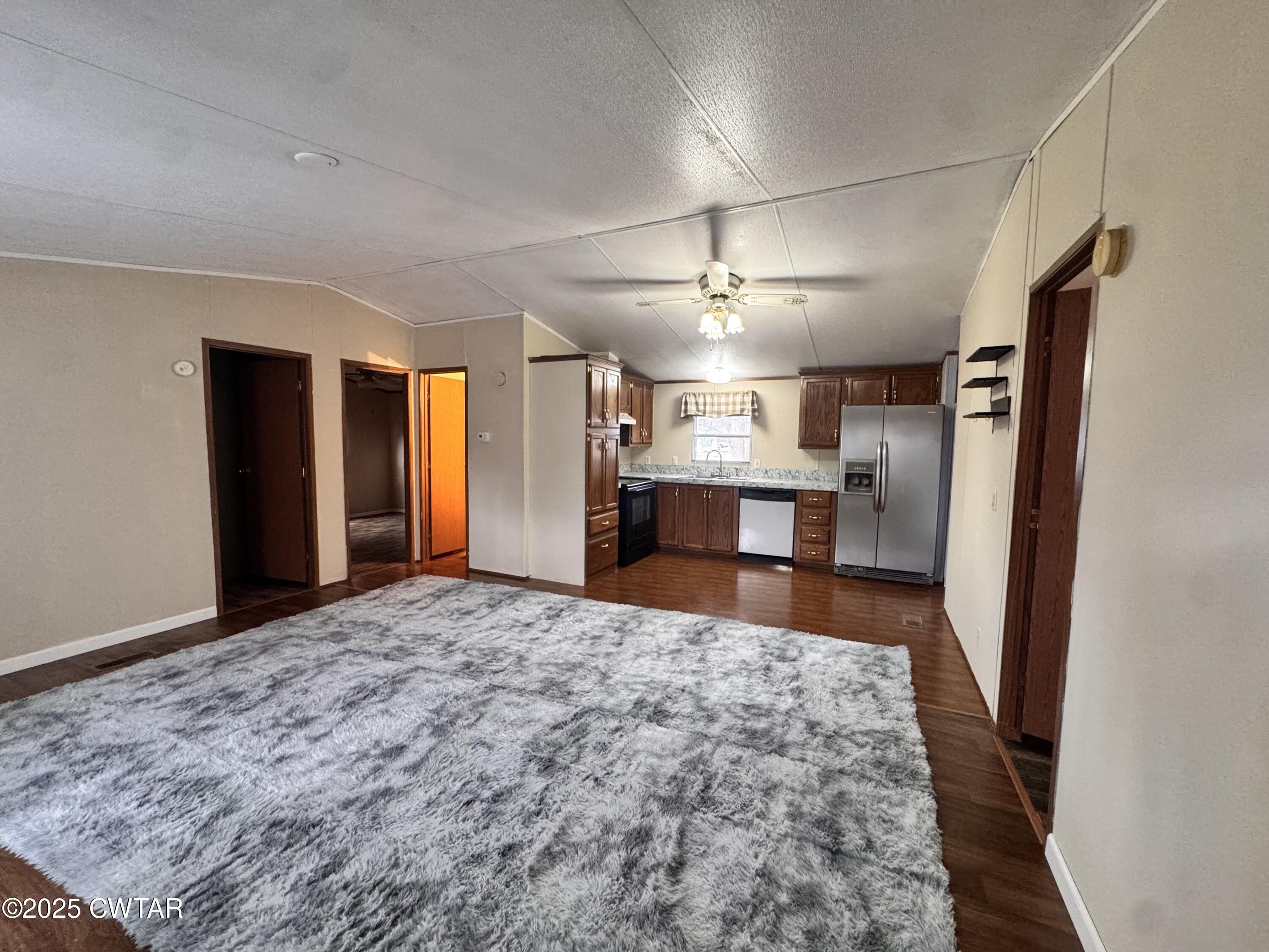 3416 West Troy Street Rives, TN 38253 - Photo 4 of 21 a view of a kitchen with a refrigerator and a sink