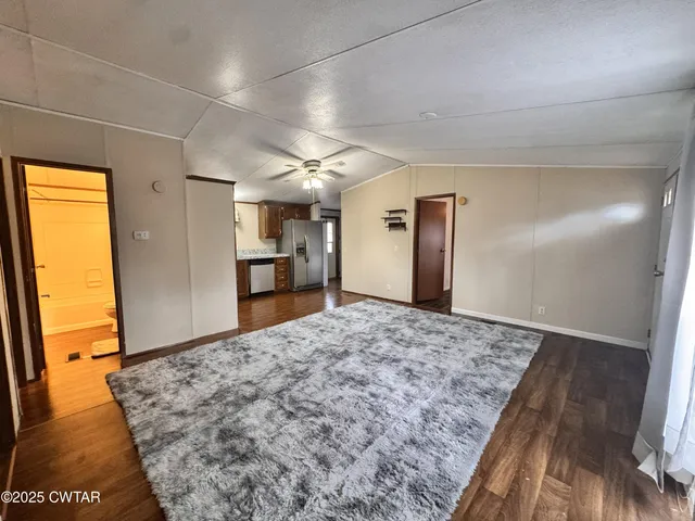 a view of a bedroom and a bedroom