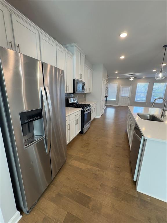 20 Wren Drive Roswell, GA 30076 - Photo 15 of 37 a kitchen with stainless steel appliances granite countertop a refrigerator a stove and a sink