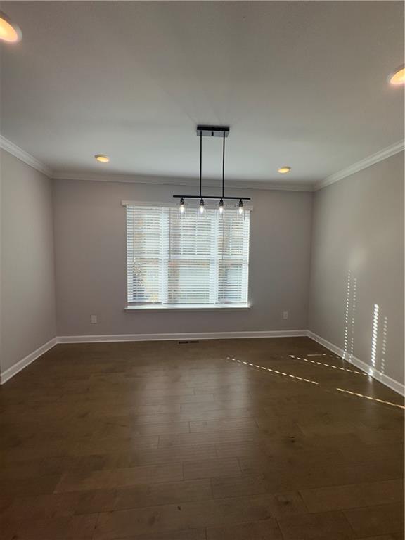 20 Wren Drive Roswell, GA 30076 - Photo 16 of 37 an empty room with wooden floor and windows