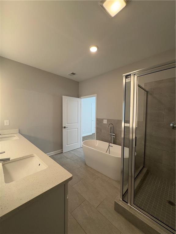 20 Wren Drive Roswell, GA 30076 - Photo 26 of 37 a room with a bed and a shower