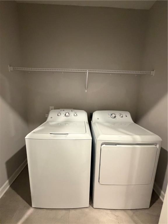 20 Wren Drive Roswell, GA 30076 - Photo 31 of 37 a utility room with dryer and washer