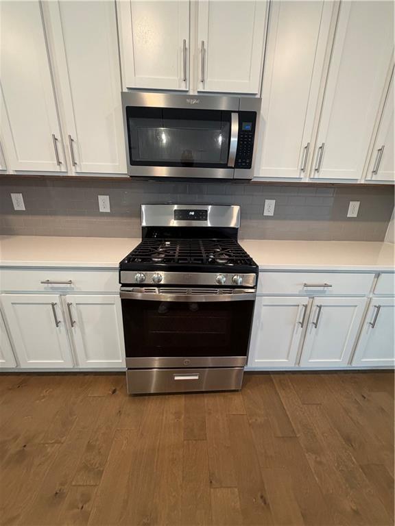 20 Wren Drive Roswell, GA 30076 - Photo 32 of 37 a stove top oven sitting inside of a kitchen