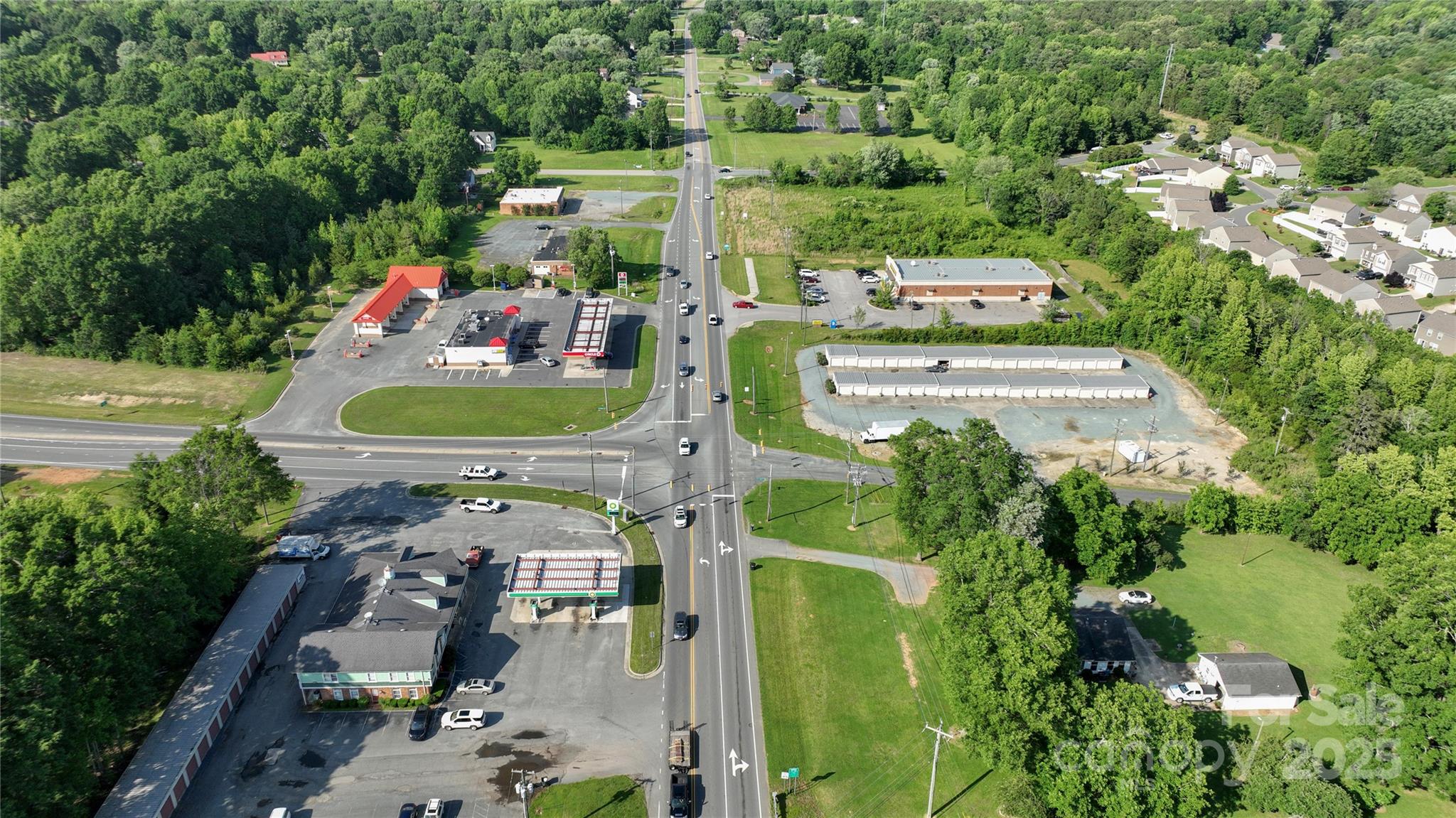 0 Avery Parker Road Monroe, NC 28112 - Photo 12 of 15 an aerial view of a house with a garden and lake view
